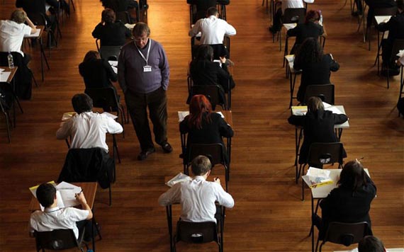 Exam results...File photo dated 02/03/12 of a maths exam in progress, as teachers feel forced to 'manipulate results' amid increasing pressure to ensure pupils pass exams, a poll suggests. PRESS ASSOCIATION Photo. Issue date date: Monday April 2, 2012. See PA story EDUCATION Exams. Photo credit should read: David Davies/PA Wire