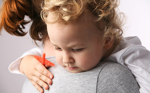 Kid on mothers hands