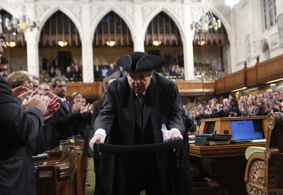 Liberal MP Mauril Belanger is given a standing ovation as he makes his way to the Speaker's Chair in the House of Commons Ottawa to preside over the House of Commons Wednesday, serving as honorary Speaker in a tribute organized by his fellow MPs following his diagnosis with ALS last November, in Ottawa Wednesday March 9, 2016. THE CANADIAN PRESS/Fred Chartrand