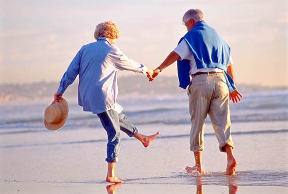 Playful couple on the beach