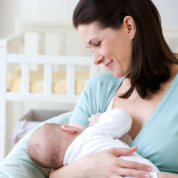 Mother breastfeeding baby