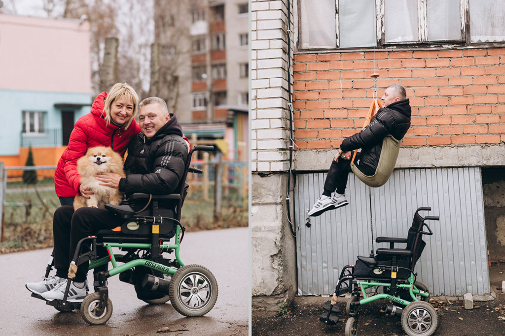 Мужчина спускается с балкона на лебедке