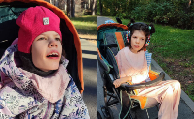 Девочка в специальной коляске