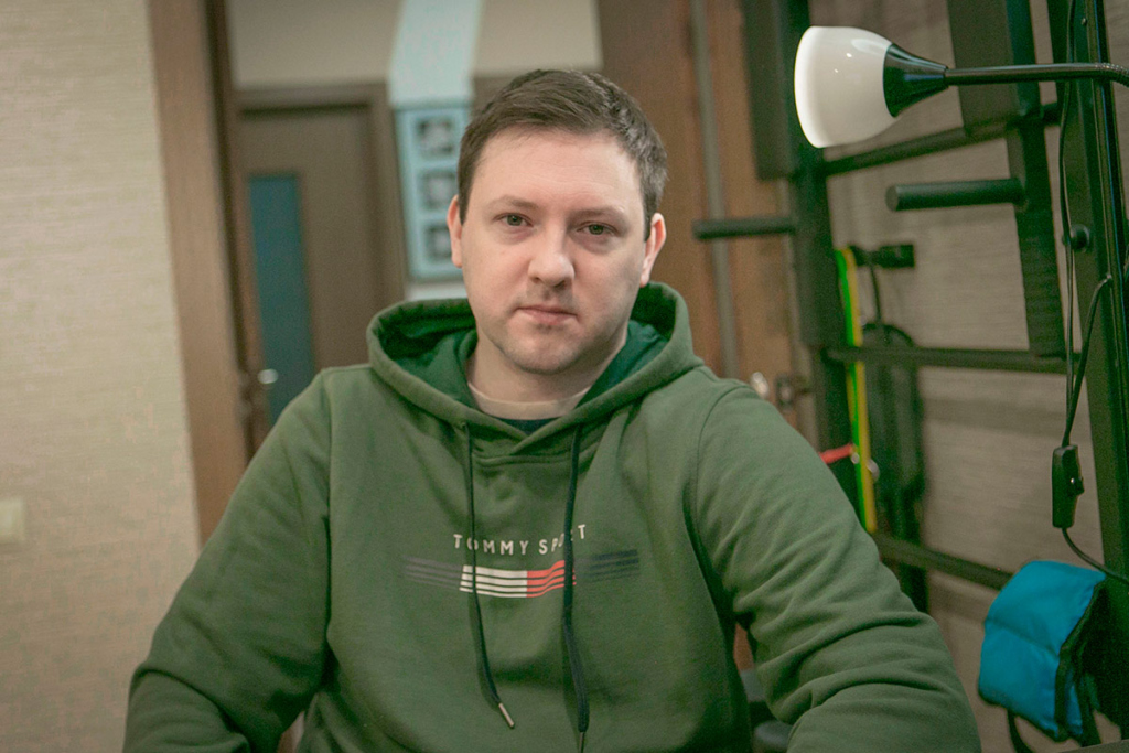 Портрет мужчины в коляске