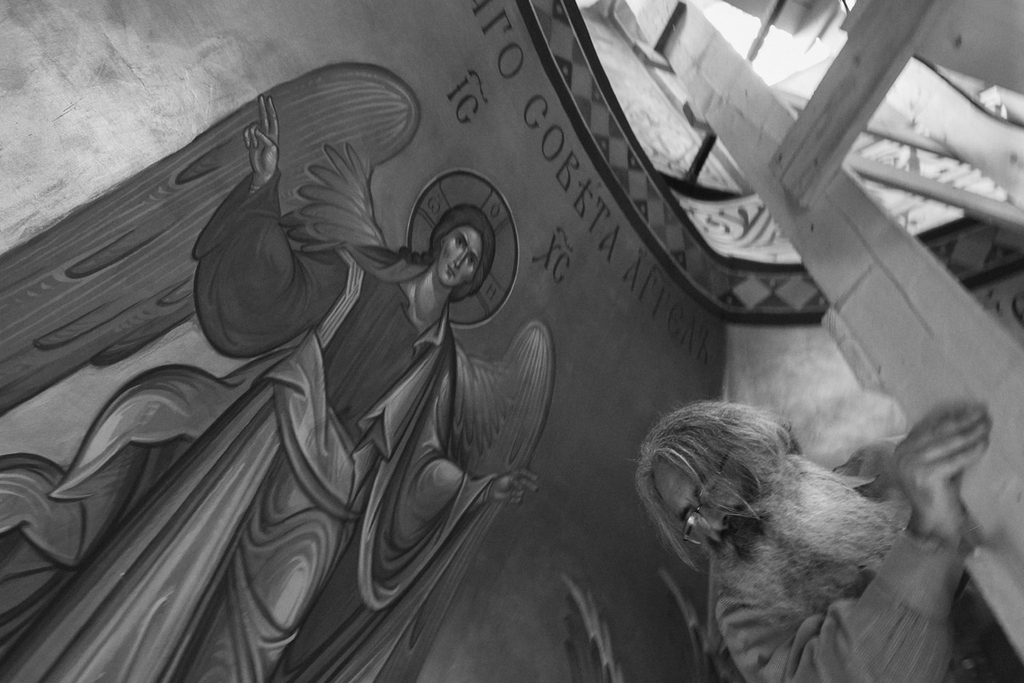 священник